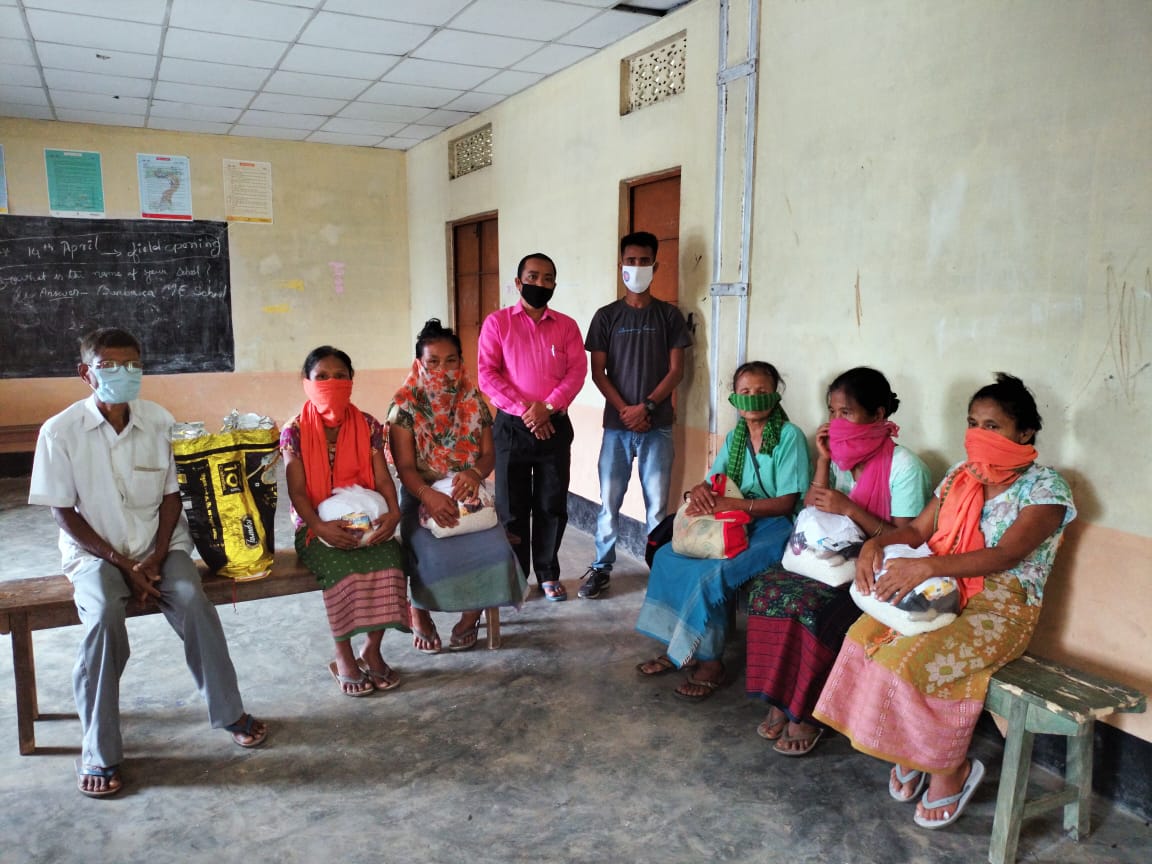 Distribution of rations to the villagers of Baka, a village adopted by North Gauhati College